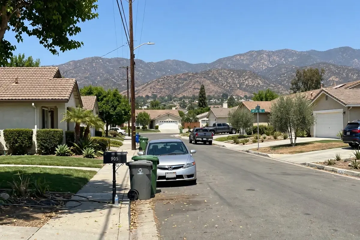 Azusa historic Route 66 corridor street with bungalows and palm trees